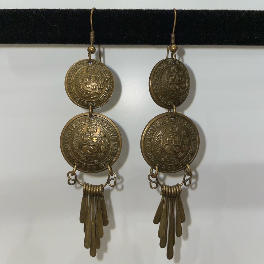 Peruvian currency fashioned into earrings.
